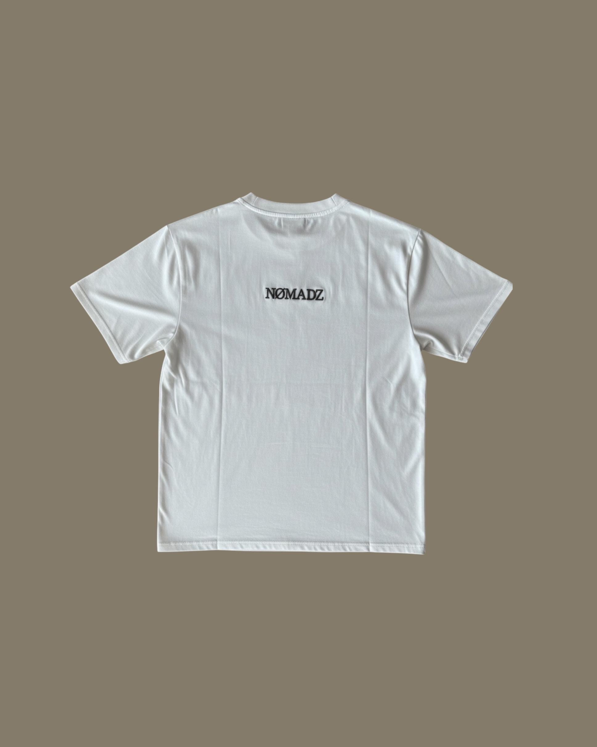 NØMADZ white T-shirt with logo on the back