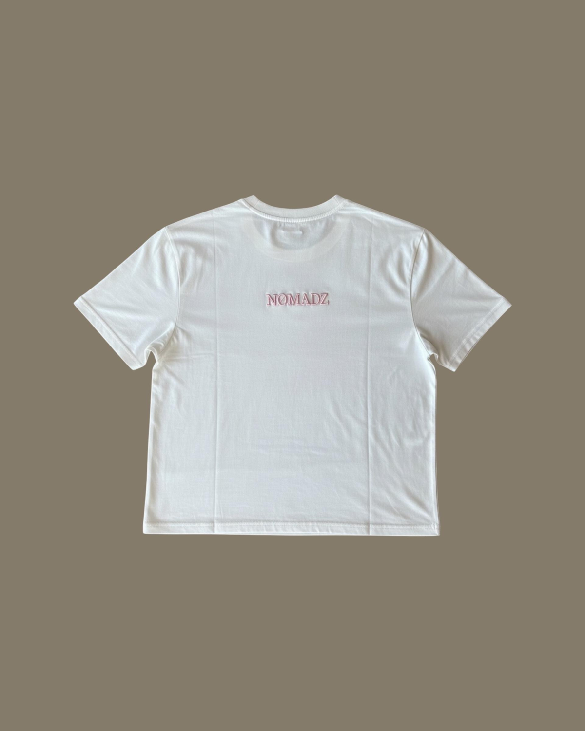 NØMADZ white women's one-size T-shirt with pink logo on the back